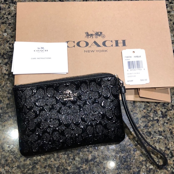 Coach Handbags - Coach authentic brand new pouch/wristlet